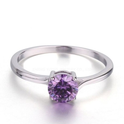 Stříbrný prsten s fialovým zirkonem (1,30 g, 49)