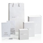 Stříbrné náušnice visací s bílou říční perlou 21026.1