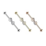Zlacený industrial piercing - nekonečno