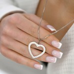 Stříbrný přívěsek s krystaly Swarovski bílé srdce 34092.1