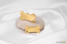 Ocelová psí známka ve tvaru kosti s tlapičkou zlatá